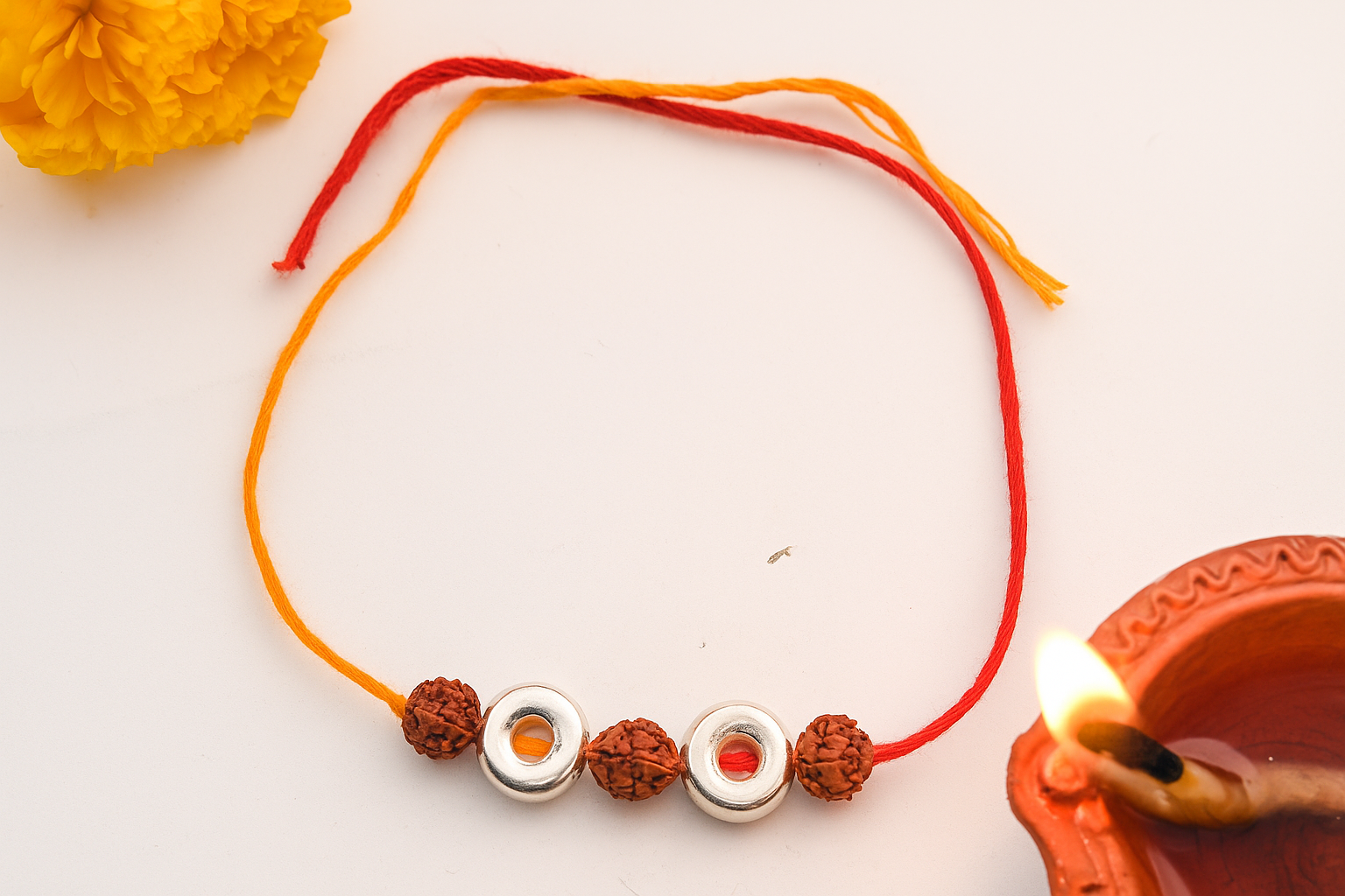 Silver Dual Rudraksha Wheel Rakhi